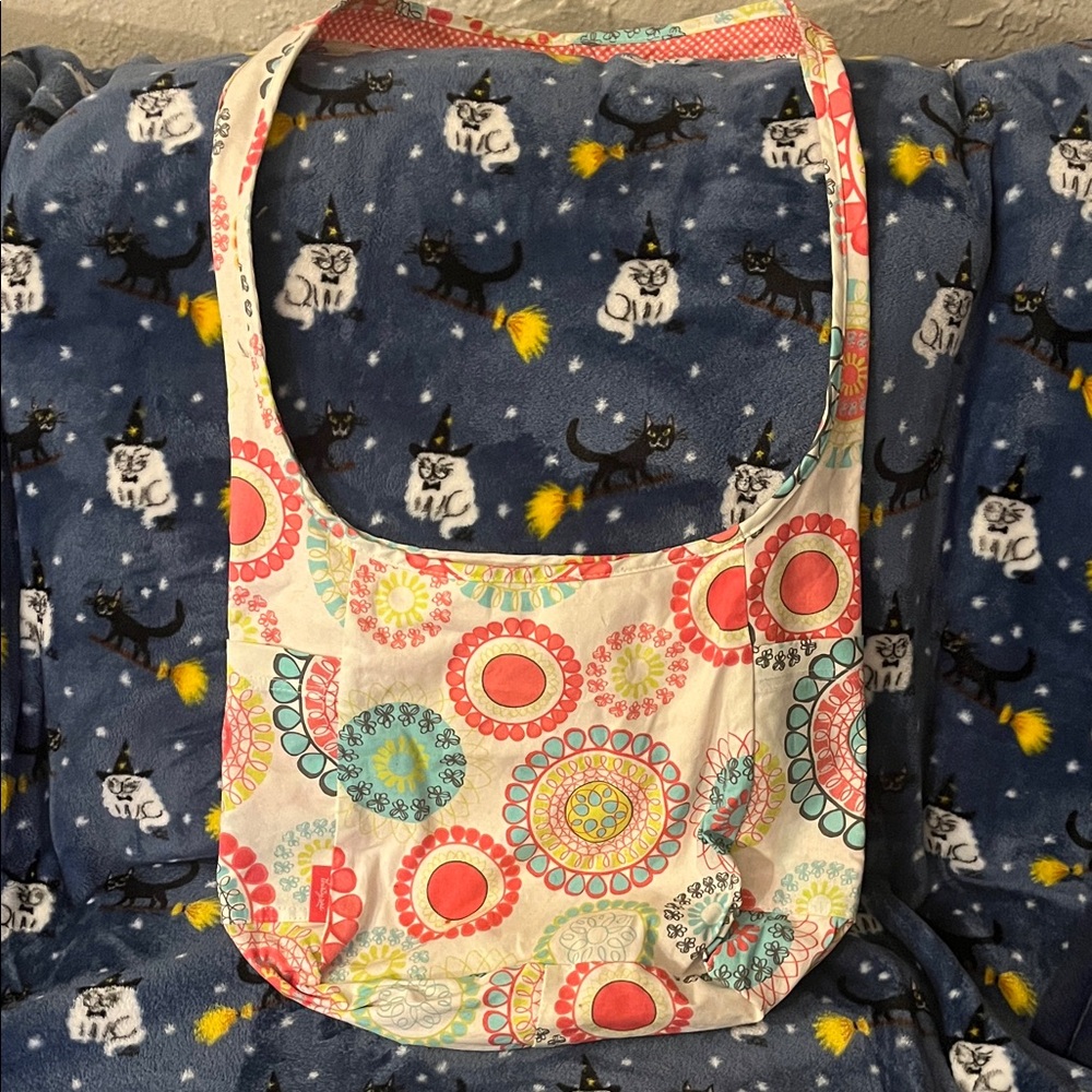 Thirty-one colorful boho crossbody. Reversible , never used.